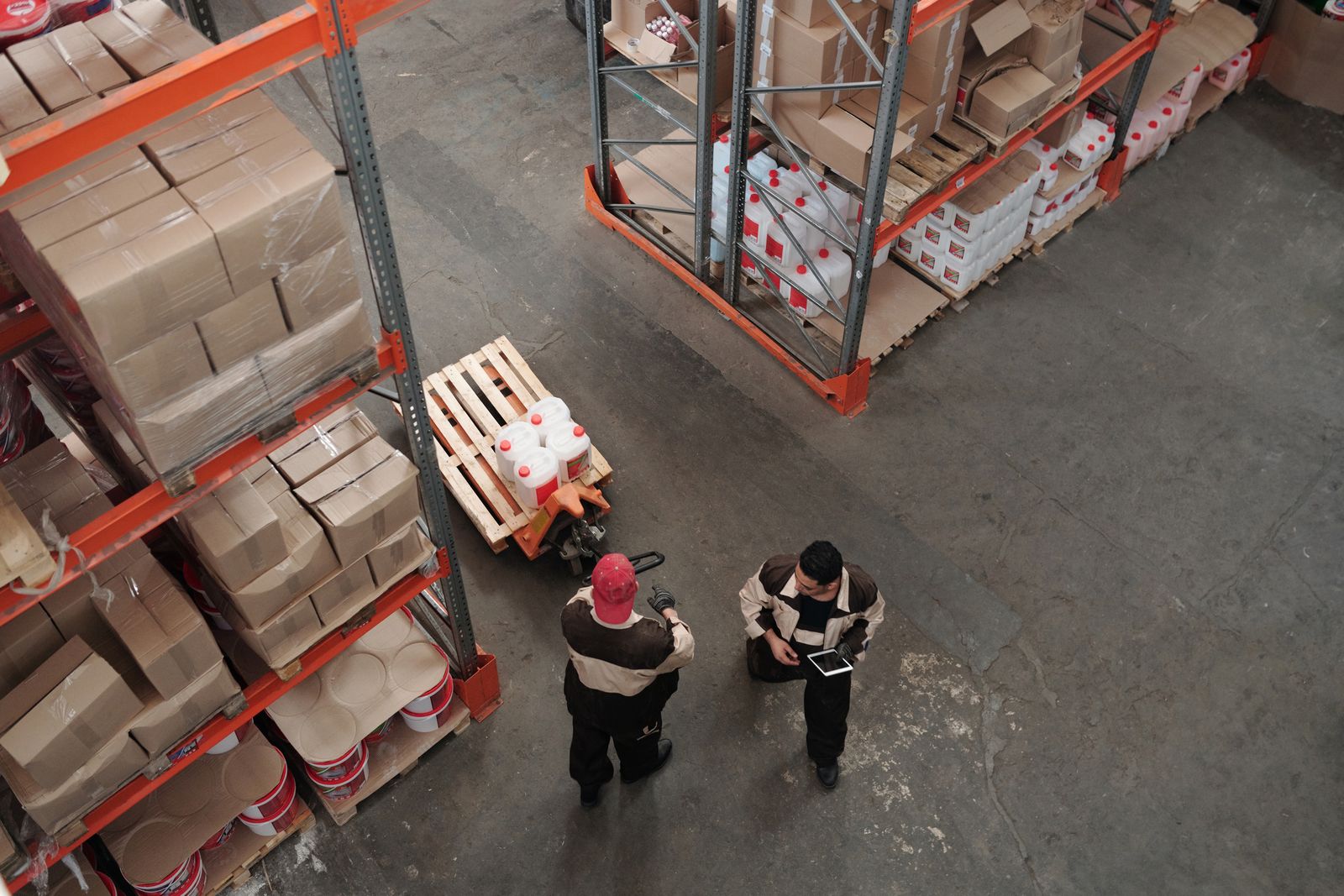 Warehouse team coordinating inventory and freight handling